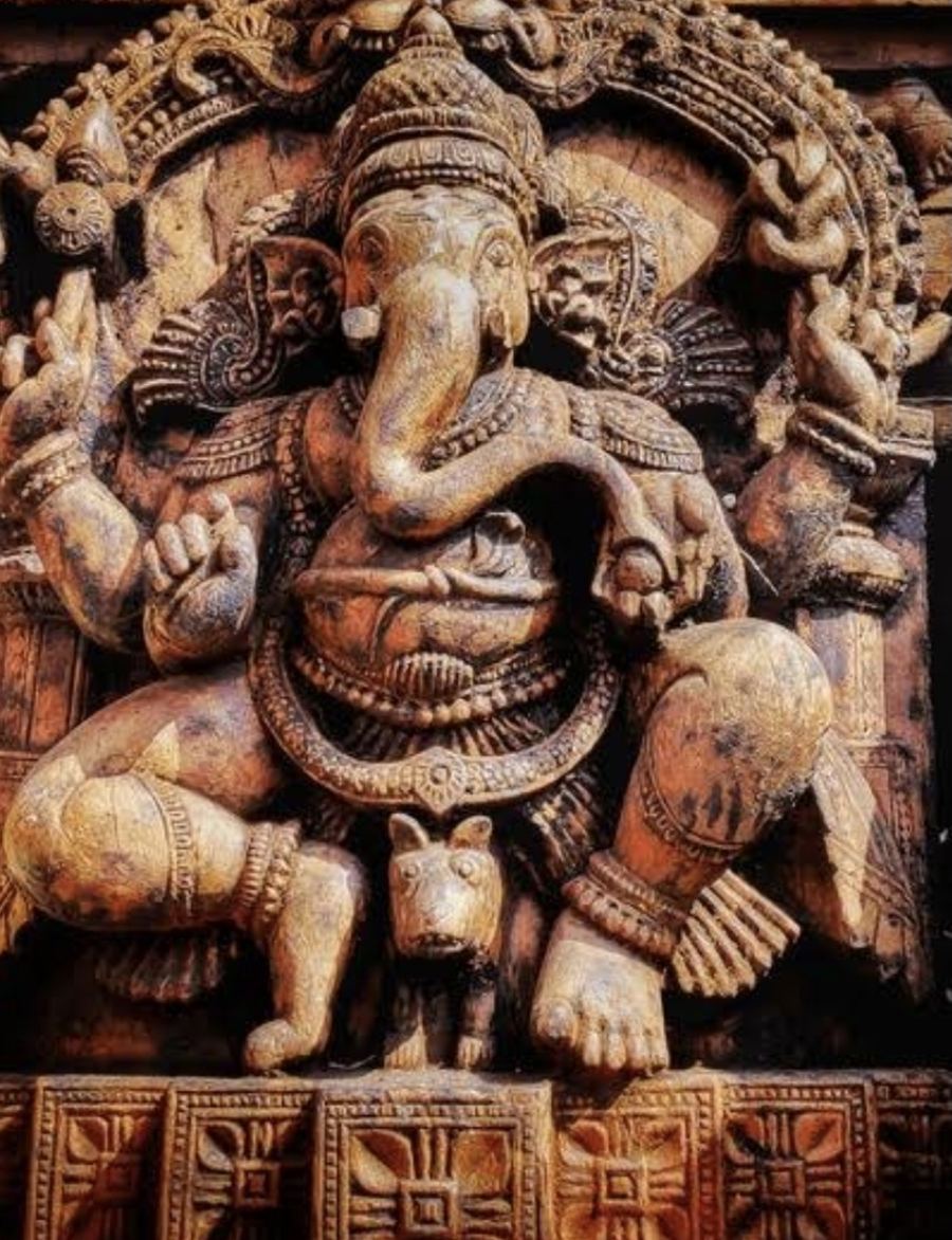 Photograph of a carved wooden Ganesha panel at the Kukke Subrahmanya Swamy Temple